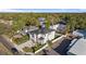Aerial view of a modern home with lush landscaping in a desirable neighborhood at 4405 W Euclid Ave, Tampa, FL 33629