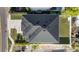 Aerial view showcasing the home's roof, landscaping, and surrounding neighborhood at 4405 W Euclid Ave, Tampa, FL 33629