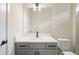 Bathroom featuring a modern vanity, quarts countertop, and sleek black fixtures at 4405 W Euclid Ave, Tampa, FL 33629