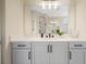 Bright bathroom featuring modern vanity with quartz countertop and sleek black fixtures at 4405 W Euclid Ave, Tampa, FL 33629