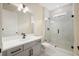Modern bathroom with a glass-enclosed shower, sleek vanity, and elegant finishes at 4405 W Euclid Ave, Tampa, FL 33629