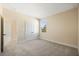 Bedroom with a closet and natural light from the window at 4405 W Euclid Ave, Tampa, FL 33629