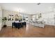 Open concept kitchen and dining area with modern white cabinetry and a large island with seating at 4405 W Euclid Ave, Tampa, FL 33629