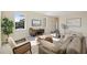 Comfortable living room with a plush sofa, stylish decor, and a cozy atmosphere at 4405 W Euclid Ave, Tampa, FL 33629