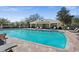 Community pool, shaded seating, and beautiful brick-laid deck at 4723 Barnstead Dr, Riverview, FL 33578