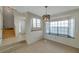Open entryway with tile flooring, staircase, and natural light at 5014 Sterling Manor Dr, Tampa, FL 33647
