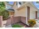 Two-story home with yellow siding and attached garage at 5014 Sterling Manor Dr, Tampa, FL 33647
