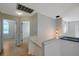 Hallway with lighting fixture and banister at 5014 Sterling Manor Dr, Tampa, FL 33647