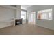 Bright living room with fireplace and tile flooring showcases open floor plan at 5014 Sterling Manor Dr, Tampa, FL 33647