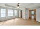 Spacious main bedroom boasts ample natural light and a ceiling fan at 5014 Sterling Manor Dr, Tampa, FL 33647