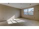 Sunlit bedroom ready for new finishes featuring new paint and large windows at 5026 Water Oak Dr # 220, Bradenton, FL 34207