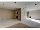 Open-concept living room with view into the kitchen; ready to be remodeled at 5026 Water Oak Dr # 220, Bradenton, FL 34207