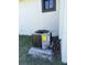 Exterior shot of the air conditioning unit located next to the house and on a concrete slab at 5166 Deltona Blvd, Spring Hill, FL 34606