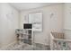 A modern Bedroom with a crib and an organized shelf for storage at 5208 S 82Nd St, Tampa, FL 33619
