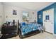 Bedroom with a bed, side table, and view from the window at 5208 S 82Nd St, Tampa, FL 33619