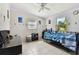 Bedroom with bed, ceiling fan, and string lights at 5208 S 82Nd St, Tampa, FL 33619