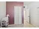 Hallway view with unicorn toy and closet at 5208 S 82Nd St, Tampa, FL 33619