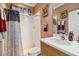 This bathroom includes a vanity with decorative mirror and ample counter space, plus a shower and toilet at 5444 90Th Avenue E Cir, Parrish, FL 34219
