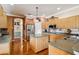 This kitchen includes stainless steel appliances, an island, and plenty of cabinet space at 5444 90Th Avenue E Cir, Parrish, FL 34219