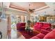 Expansive living room with patio access, stylish seating, and open to the kitchen at 5444 90Th Avenue E Cir, Parrish, FL 34219