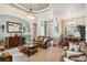 Spacious living room featuring hardwood floors, sophisticated furnishings, and an open layout at 5444 90Th Avenue E Cir, Parrish, FL 34219