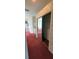 Walk-in closet with shelving and mirrored doors at 7279 Maidencane Ct, Seminole, FL 33777