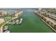 Beautiful aerial view of the harbor with boats and waterfront condos in the distance at 7300 Sun Island S Dr # 1705, South Pasadena, FL 33707