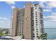 Spacious condo building with bay views, private balconies, and convenient covered parking at 7300 Sun Island S Dr # 1705, South Pasadena, FL 33707