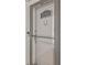 Apartment front door at 1705 features secure entry with glass and updated hardware at 7300 Sun Island S Dr # 1705, South Pasadena, FL 33707