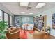A quiet library with large bookshelves, comfortable seating, and natural light at 7300 Sun Island S Dr # 1705, South Pasadena, FL 33707