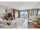 Inviting living room with a large window offering views of the water and nearby harbor at 7300 Sun Island S Dr # 1705, South Pasadena, FL 33707