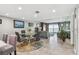 Comfortable living space with dining area, neutral decor, and views of the water at 7300 Sun Island S Dr # 1705, South Pasadena, FL 33707