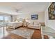 Inviting main bedroom boasting water views, hardwood floors, and ample natural light at 7300 Sun Island S Dr # 1705, South Pasadena, FL 33707