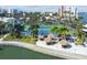 Enjoy multiple tennis courts next to lush landscaping and tropical trees and vegetation by the water at 7300 Sun Island S Dr # 1705, South Pasadena, FL 33707