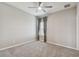 Cozy bedroom featuring a ceiling fan and neutral carpet; a peaceful retreat at 8100 Olive Brook Dr, Wesley Chapel, FL 33545