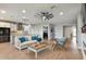 Bright living room with hardwood floors, neutral decor, and an open-concept layout at 8100 Olive Brook Dr, Wesley Chapel, FL 33545