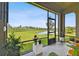 Relaxing screened patio with plants, providing a serene view of the backyard at 8100 Olive Brook Dr, Wesley Chapel, FL 33545