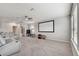 Spacious theater room with dual reclining leather seats and prewiring for a projection screen at 8100 Olive Brook Dr, Wesley Chapel, FL 33545