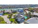 Captivating aerial view with community marina access, showcasing the neighborhood and serene waterfront living at 816 Ponce De Leon Dr, Tierra Verde, FL 33715