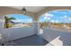 A charming balcony area with sweeping views of the neighborhood's landscape and architecture at 816 Ponce De Leon Dr, Tierra Verde, FL 33715