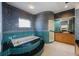 Luxurious bathroom with a jetted tub and separate walk-in shower at 816 Ponce De Leon Dr, Tierra Verde, FL 33715