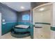 Modern bathroom with a soaking tub and a walk-in shower at 816 Ponce De Leon Dr, Tierra Verde, FL 33715