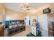 Inviting bedroom showcasing blue accent walls, a ceiling fan, and a wooden bed frame at 816 Ponce De Leon Dr, Tierra Verde, FL 33715