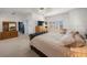 Large main bedroom with attached ensuite bathroom and multiple windows at 816 Ponce De Leon Dr, Tierra Verde, FL 33715