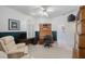 Well-lit office featuring a ceiling fan, classic furniture, and neutral walls with dark blue accent paint at 816 Ponce De Leon Dr, Tierra Verde, FL 33715