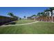 Well-maintained green space featuring walking paths, tropical landscaping and exterior storage at 8635 Midnight Pass Rd # 307C, Sarasota, FL 34242