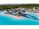 Beautiful view of sandy beach with inviting sun loungers and beach umbrellas for relaxation at 9748 Ibis Grove Blvd, Wesley Chapel, FL 33545