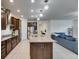 Stylish kitchen with a center island, stainless appliances, and granite countertops at 9748 Ibis Grove Blvd, Wesley Chapel, FL 33545