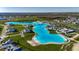 Experience the beauty of the lagoon with sandy shores, water activities, and nearby homes, creating a resort-like atmosphere at 9748 Ibis Grove Blvd, Wesley Chapel, FL 33545