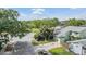 Peaceful street view with mature trees and lush landscaping, a serene neighborhood setting at 10306 Green Grove Pl, Tampa, FL 33624